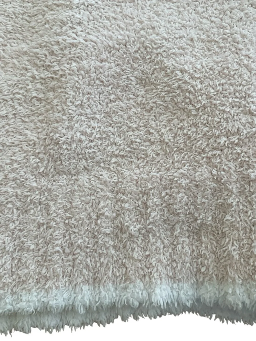 Barefoot Dreams pale pink throw